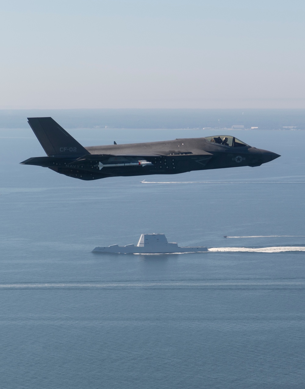 Navy's Next Gen F-35 Stealth Strike Fighter Flies Over Next Gen Stealth Guided-Missile Destroyer, USS Zumwalt (DDG 1000)