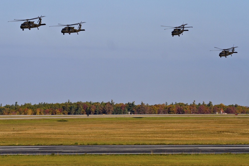UH-60 Black Hawks take off from Wheeler-Sack Airfield