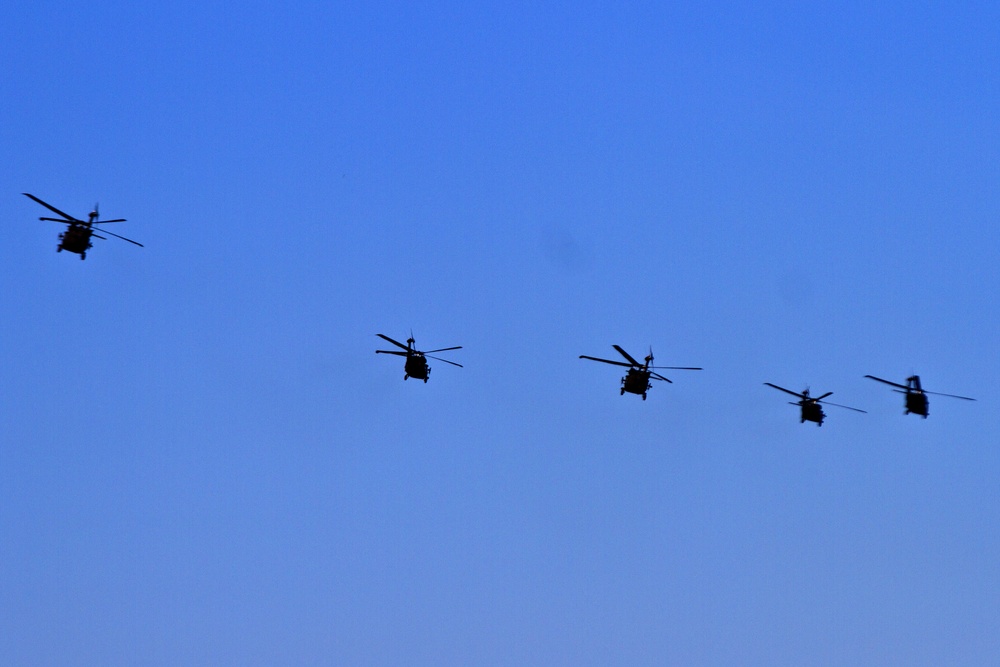 UH-60 Black Hawks fly in formation