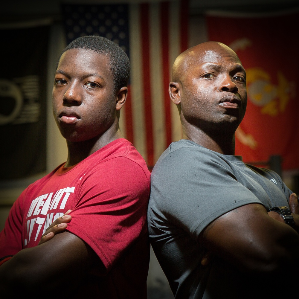 Marine dad inspires weightlifter son to victory