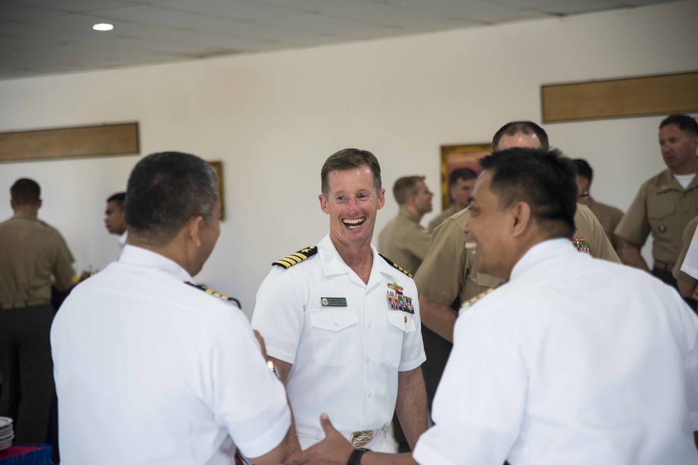 USS Green Bay Officers socialize with their Royal Malaysian Navy counterparts in Kota Kinabalu, Malaysia