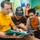 Green Bay Sailors interact with orphange children in Kota Kinabalu, Malaysia