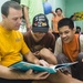 Green Bay Sailors interact with orphange children in Kota Kinabalu, Malaysia
