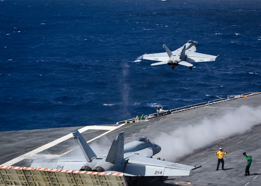 F/A - 18E launches from Nimitz