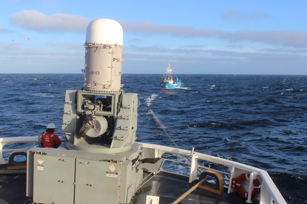 U.S. Coast Guard Cutter Morgenthau tows fishing vessel Pacific Sounder