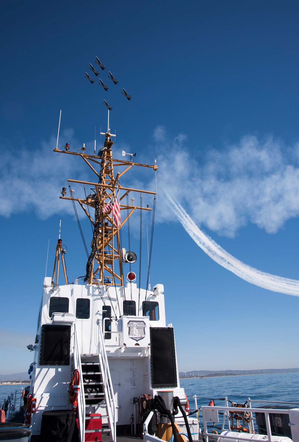 Crewmembers of Coast Guard Cutter Blackfin enforce security zone during Huntington Beach Airshow