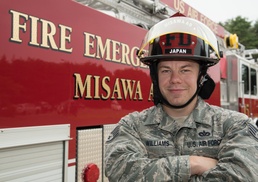 AF firefighter, flames keep burnin'