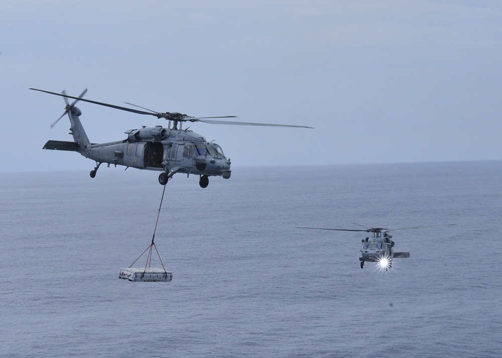 MH-60S Sea Hawks transfer ordnance