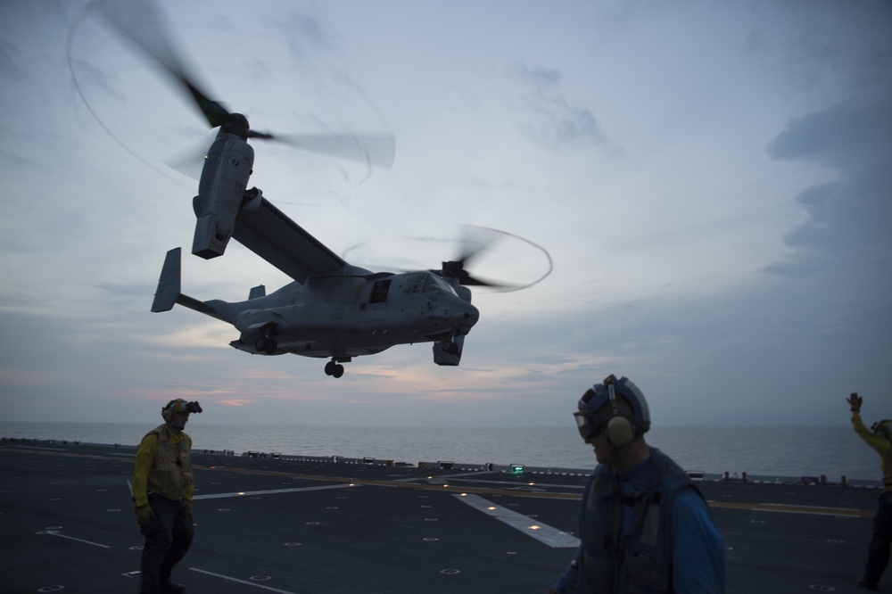 MV-22 takes off during sunset