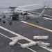 Sailors conduct at-sea ammunition onload