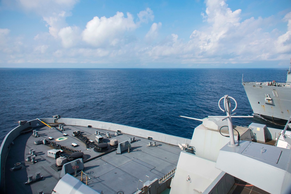 USS Green Bay conducts a replenishment at sea with USNS Washington Chambers