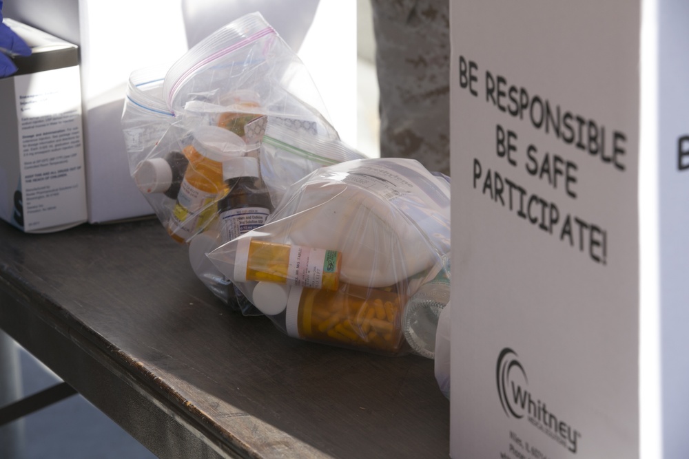 PMO helps clean up Combat Center with Drug Take Back