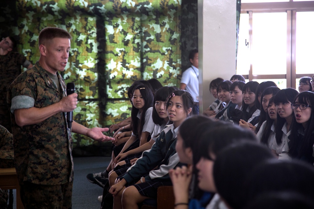 Uniting cultures, sharing languages: Okinawa students visit Kubasaki high school