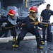 Nimitz Sailors onload ammunition
