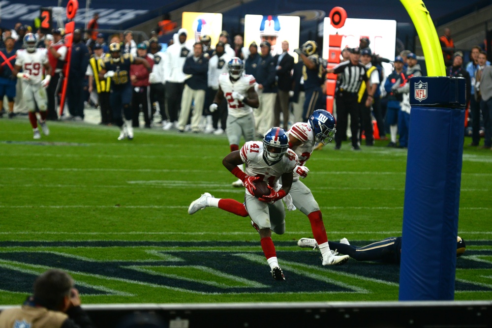 US, UK service members project partnership at NFL game in London