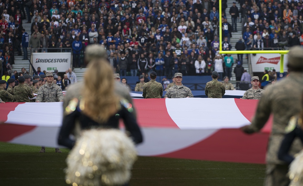 US, UK service members project partnership at NFL game in London