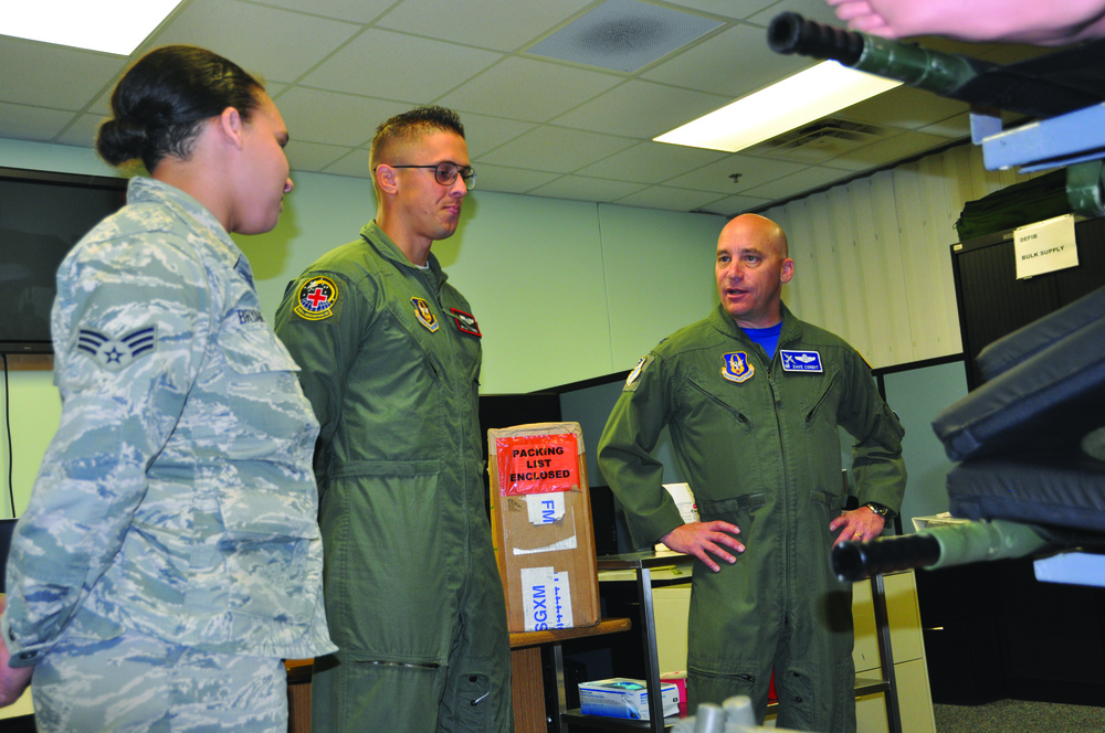 Condit visits with AES Airmen