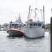 Coast Guard rescues 3, tows disabled boat for 12 hours