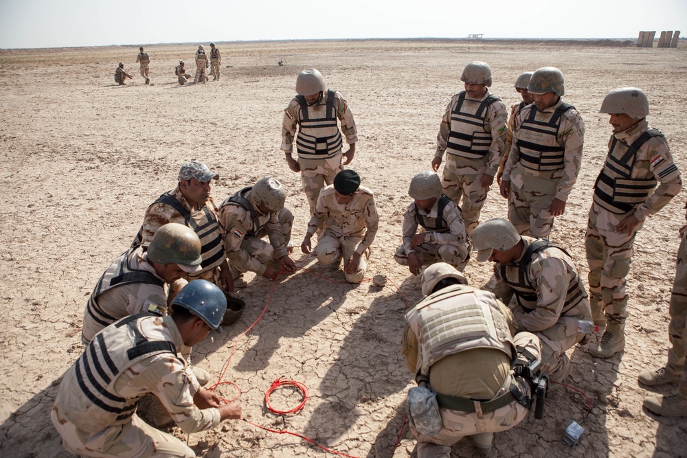 Iraqi security forces perform live fire exercise with demolitions