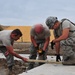 Airmen Partner with Police to Build Training Facility