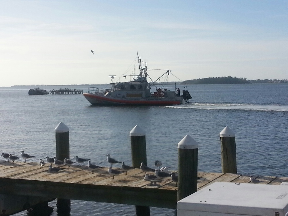 Coast Guard rescues 2 after boat takes on water