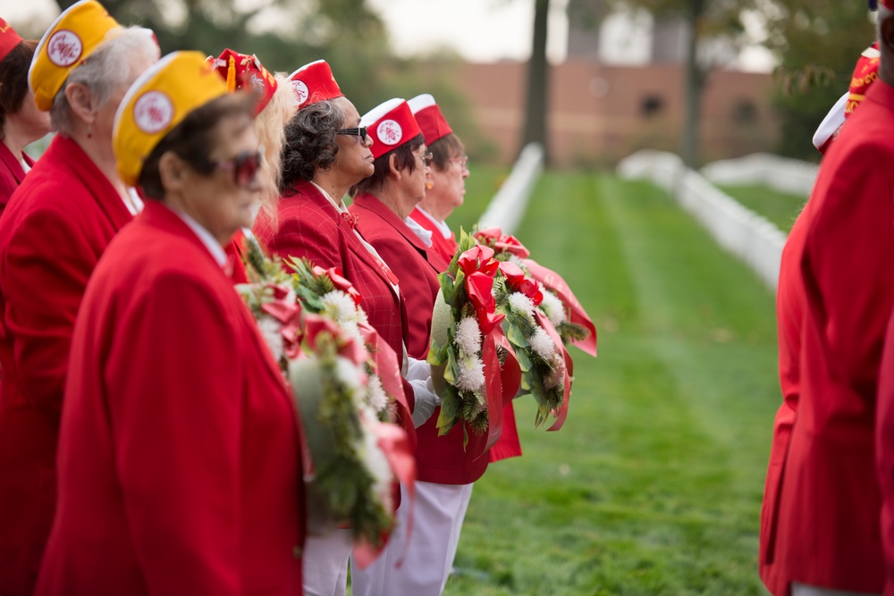 United States Military Order of the Cootie lay wreaths at the Argonne Cross in Arlington National Cemetery