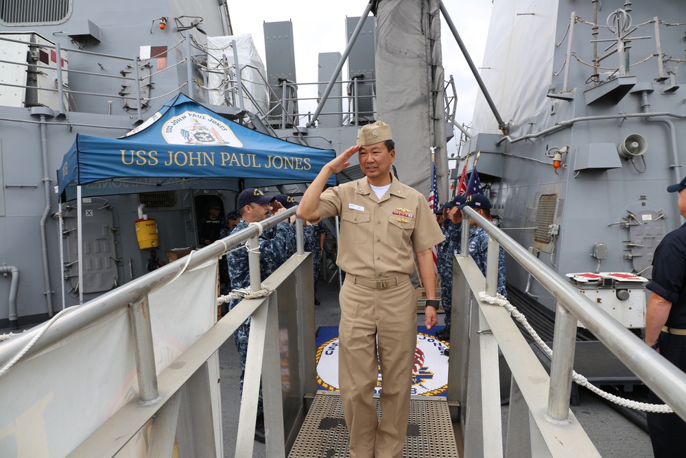 Rear Adm. Jonathan A. Yuen departs the USS John Paul Jones (DDG 53)