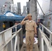 Rear Adm. Jonathan A. Yuen departs the USS John Paul Jones (DDG 53)