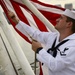 Sailors conducts morning colors