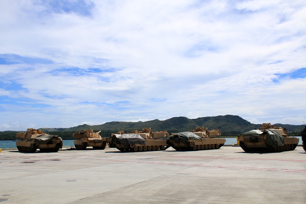 Marines land in Apra Harbor to offload tanks, equipment