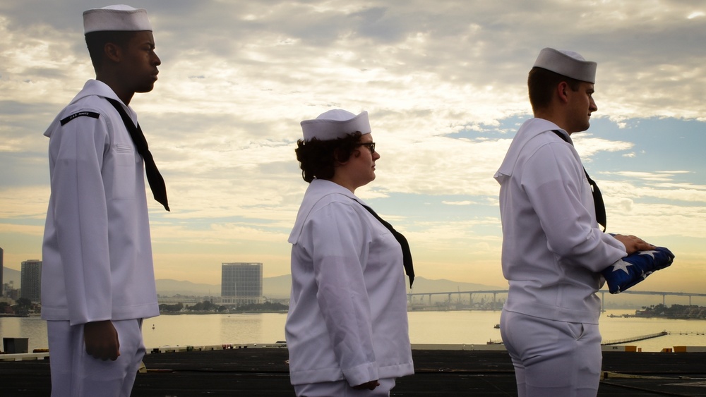 Sailors conduct morning colors