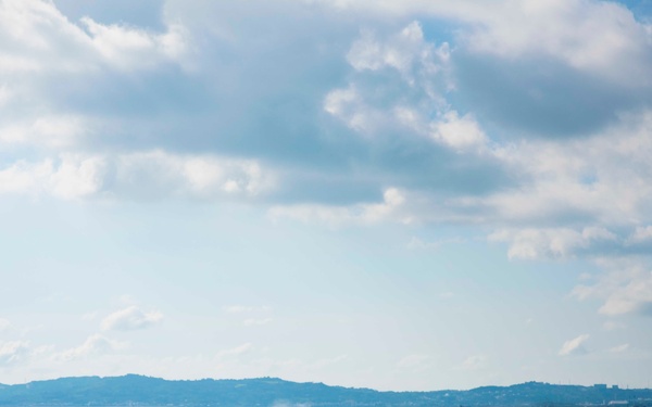 LCAC 9 transits past USS Green Bay