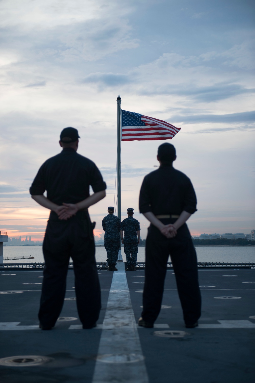 USS Coronado (LCS 4) conducts evening colors.