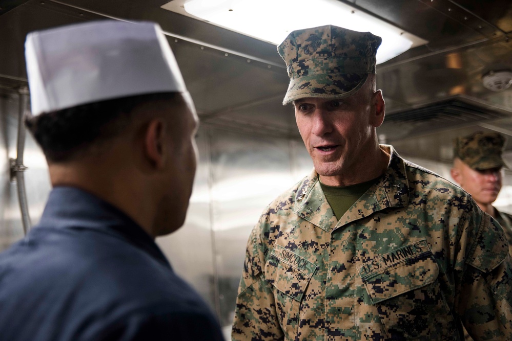 Maj. Gen. Richard Simcock visits with Sailors and Marines aboard USS Green Bay during Blue Chromite 2017