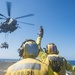 Super Stallion lifts helicopter from Green Bay