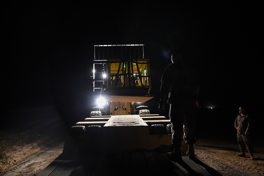 MC-130H performs cargo drops