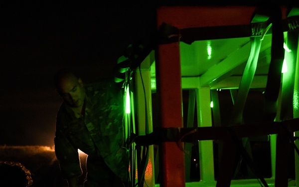 MC-130H performs cargo drops