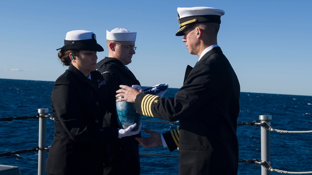 USS Zumwalt Sailors conduct burial at sea