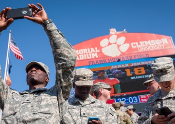 Soldiers and phones in Memorial Stadium