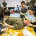 U.S. Sailors demonstrate CLS skills with Romanian students