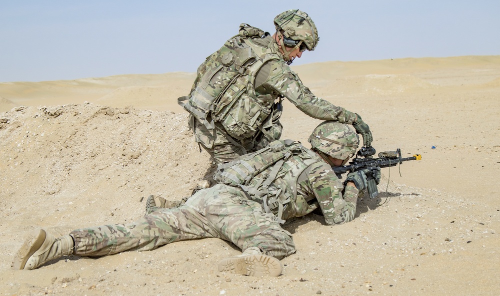 US Infantry Soldiers Assault Through the Desert: Live Fire Exercise