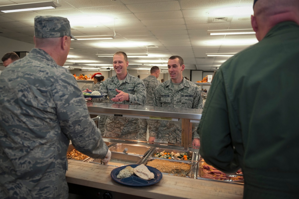 Wing leadership serves holiday lunch