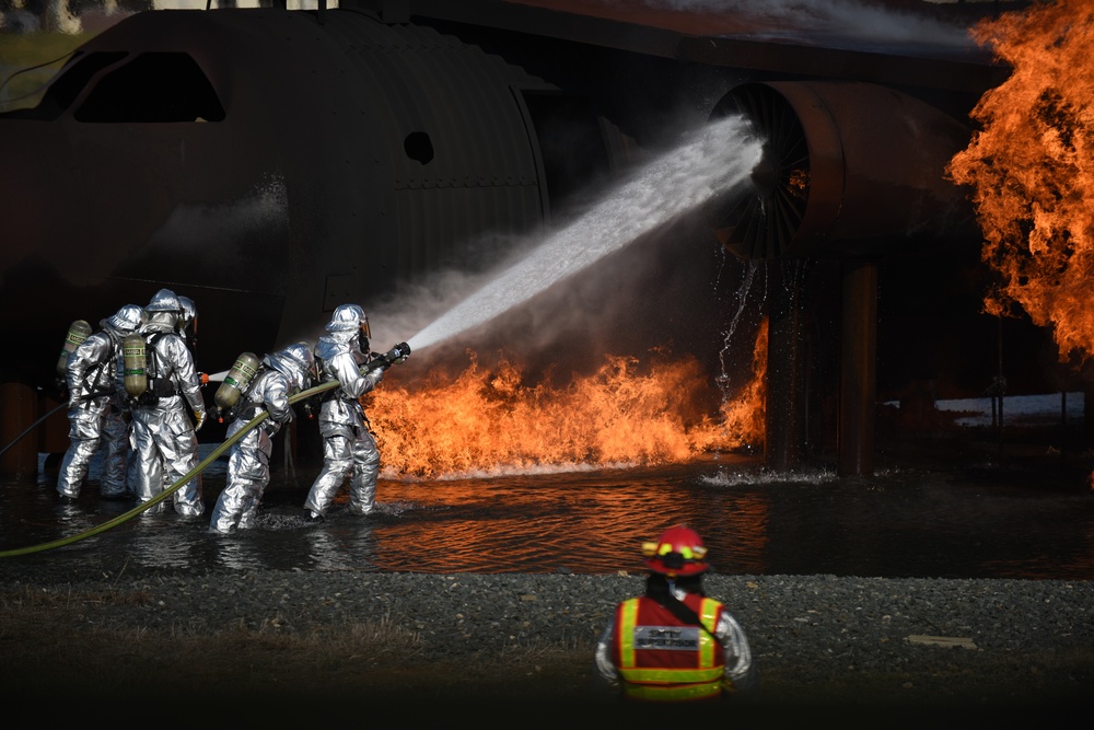 Firefighters stop the burn