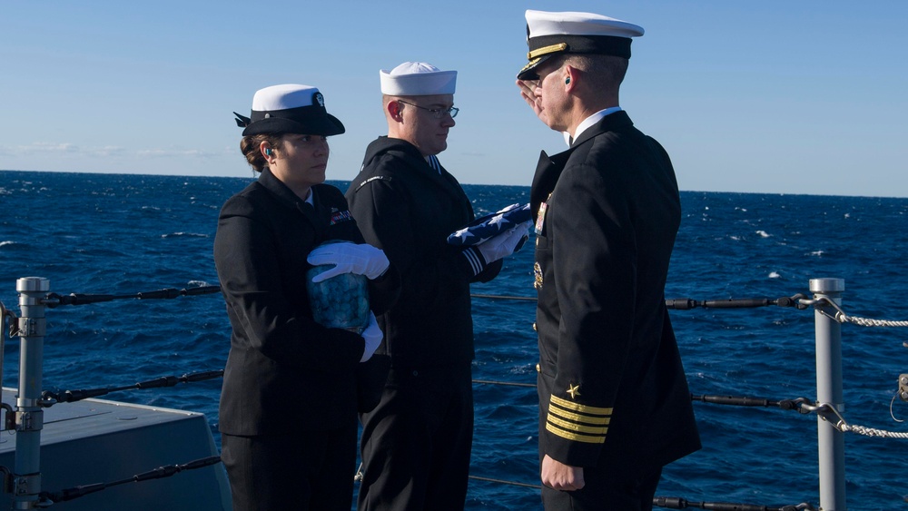 USS Zumwalt Sailors conduct burial at sea