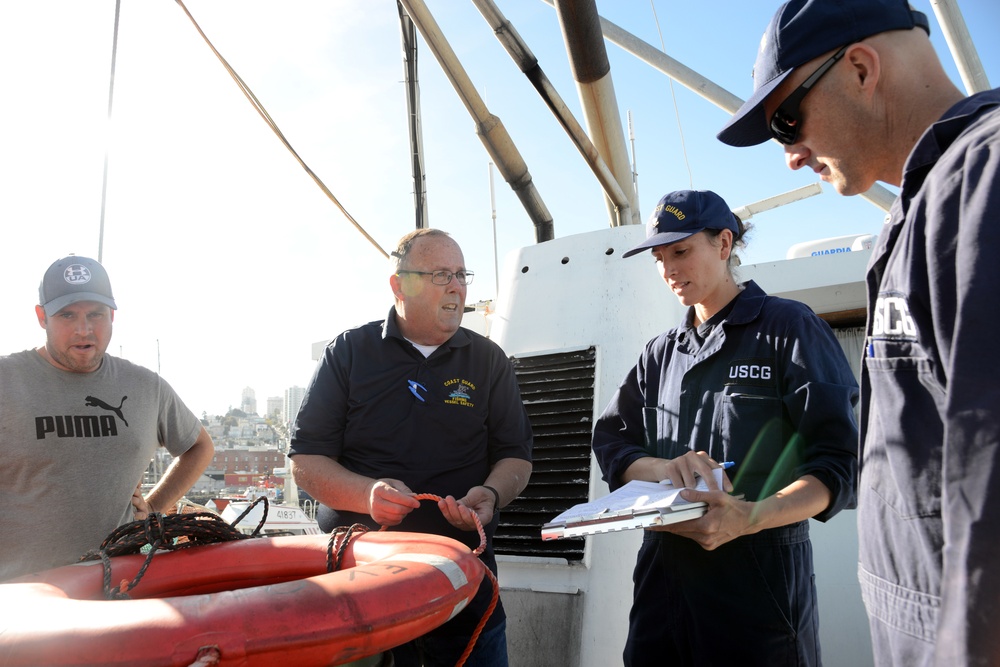 A Coast Guard marine inspector explains how to inspect a life ring