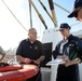 A Coast Guard marine inspector explains how to inspect a life ring