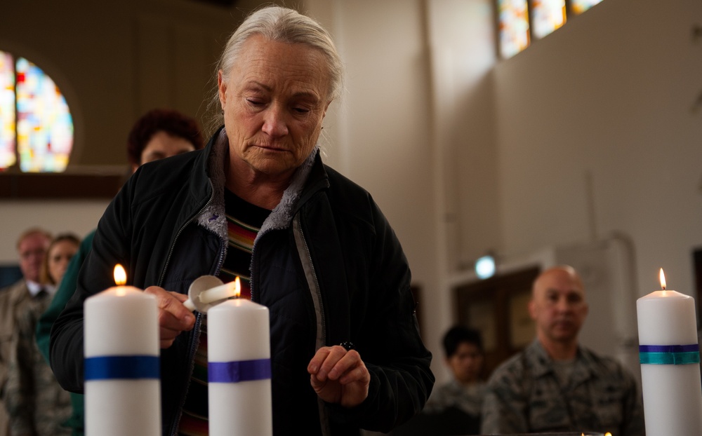 Shining light on a sensitive topic: chapel hosts candlelight vigil for interpersonal violence victims
