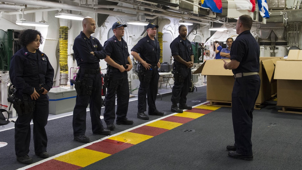 USS Zumwalt Sailors participate in small arms training