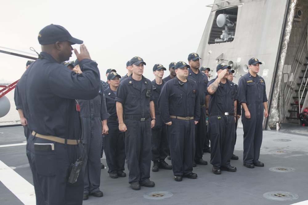USS Coronado (LCS 4) sailors conduct a duty section turnover