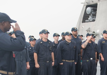USS Coronado (LCS 4) sailors conduct a duty section turnover